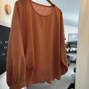 Women's Relaxed Round-Neck Top in pink.